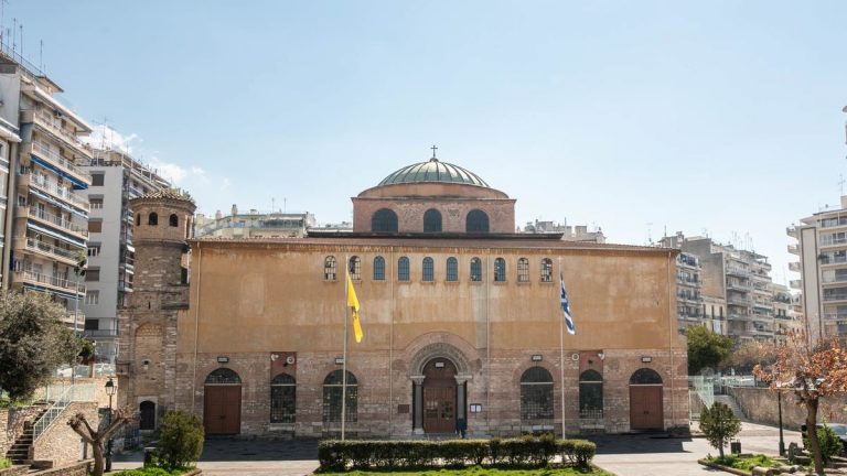 Front view of the historic Hagia Sophia Church in Thessaloniki, Greece, under a clear blue sky.